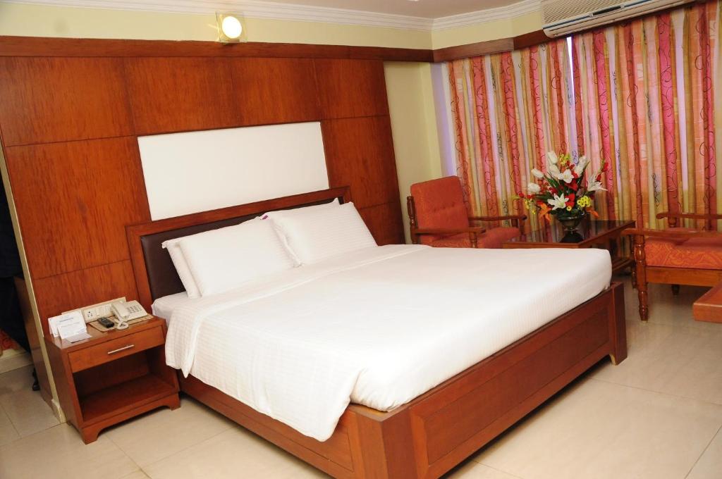 Postel nebo postele na pokoji v ubytování Hotel PLR Grand