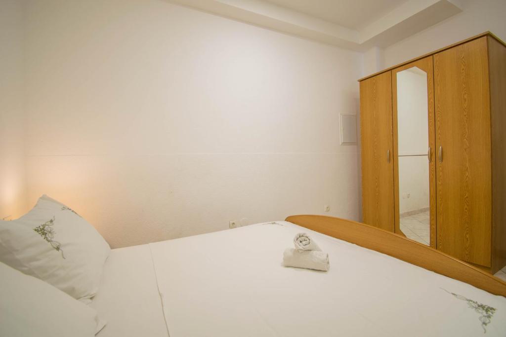 Postel nebo postele na pokoji v ubytování Apartments Manuela - Baška Voda