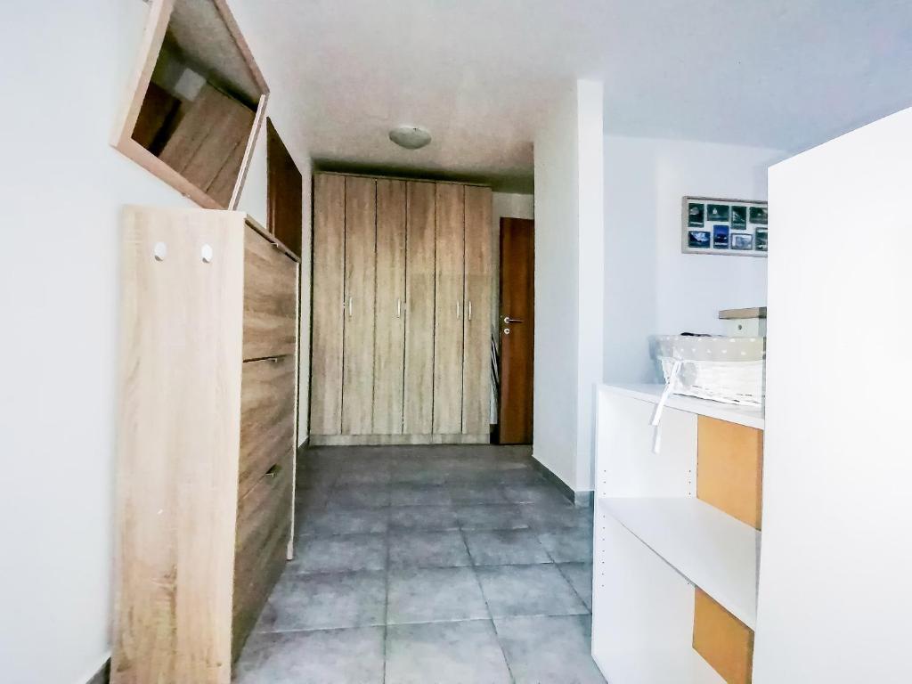 Kuchyň nebo kuchyňský kout v ubytování Apartments Siesta