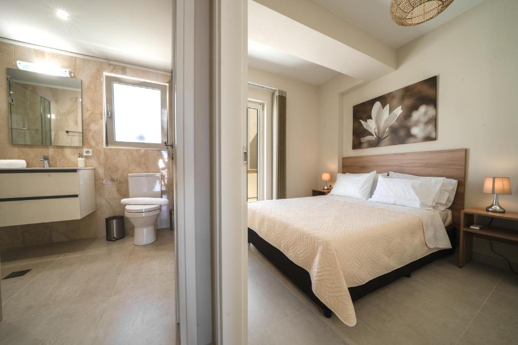 Posteľ alebo postele v izbe v ubytovaní Alma City Center Apartment's