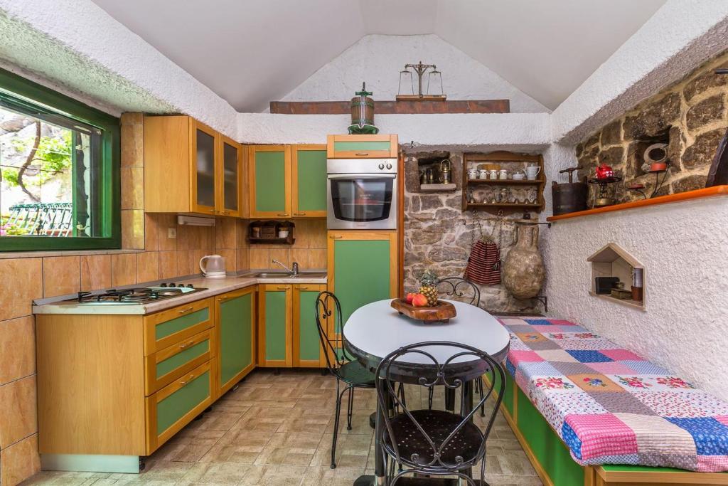 Kuchyňa alebo kuchynka v ubytovaní Mini stone house