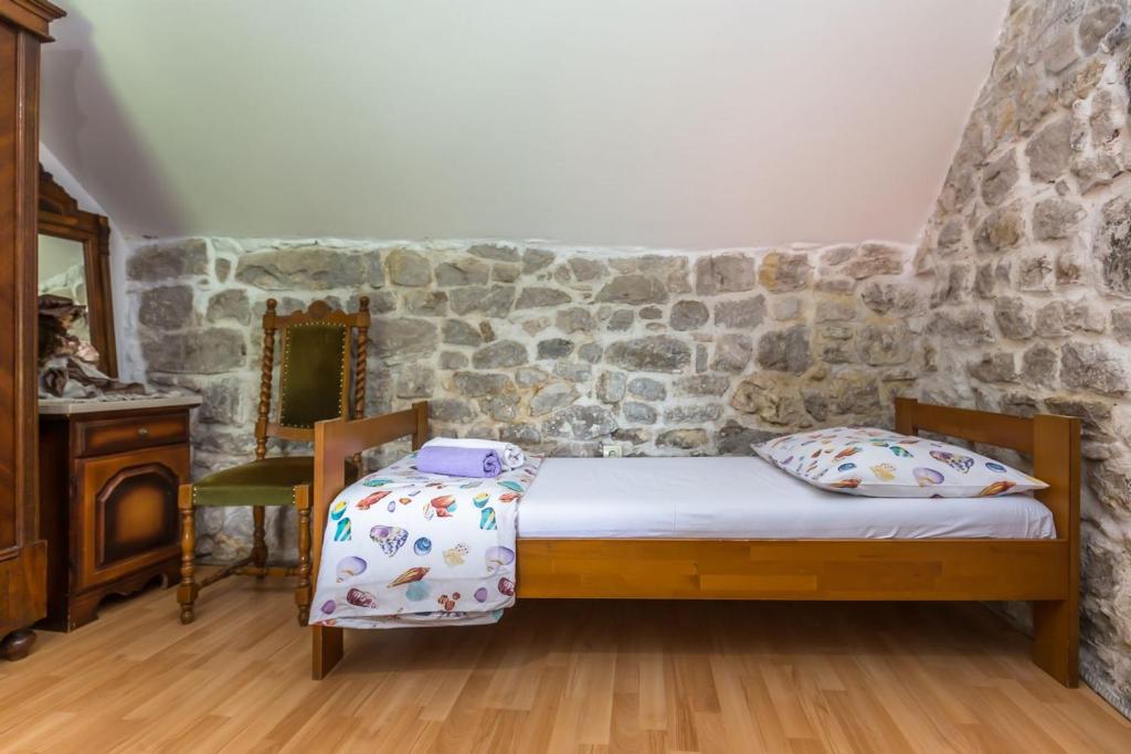 Posteľ alebo postele v izbe v ubytovaní Mini stone house
