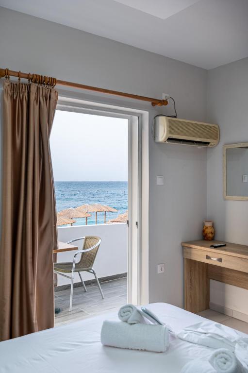 Postel nebo postele na pokoji v ubytování Sea Kiato Apartment