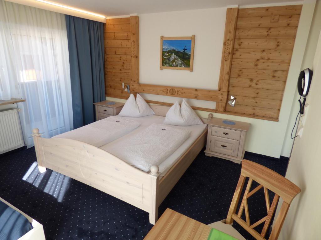 Postel nebo postele na pokoji v ubytování Panoramahotel