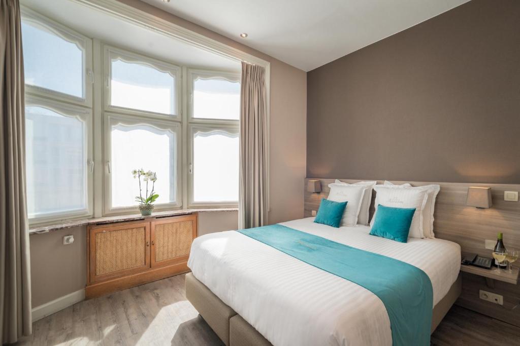 Postel nebo postele na pokoji v ubytování Hotel Maraboe