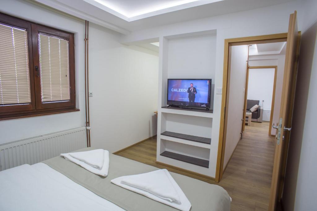 Postel nebo postele na pokoji v ubytování Hotel Pavlović