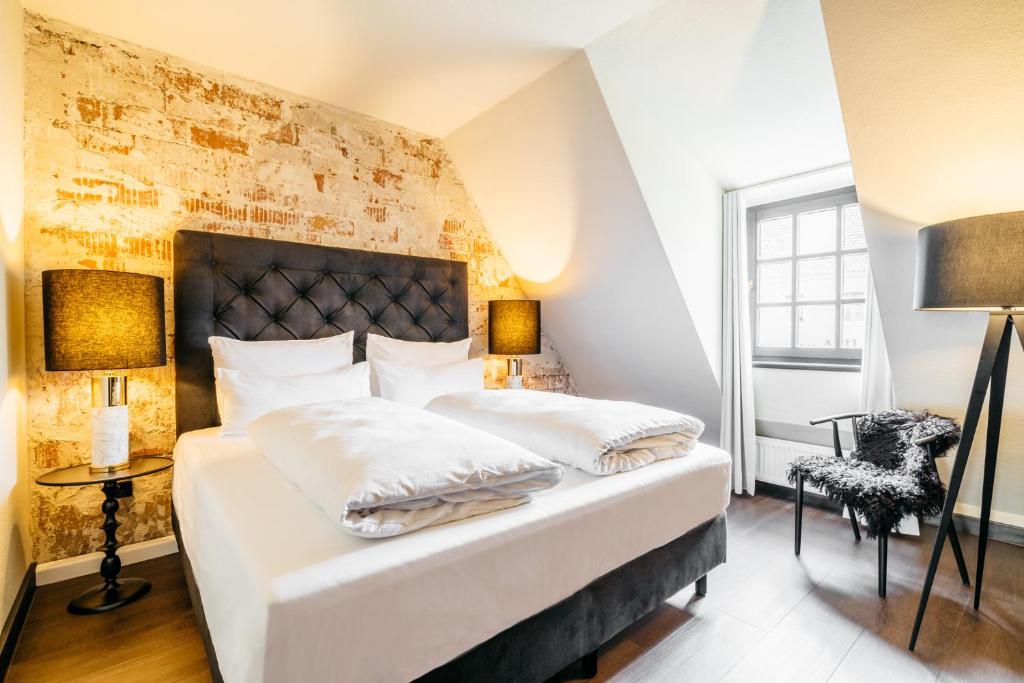 Ein Bett oder Betten in einem Zimmer der Unterkunft Hotel Riesengebirge