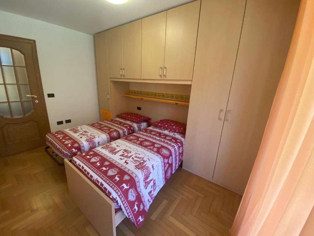 Postel nebo postele na pokoji v ubytování DOMUS ALPINA