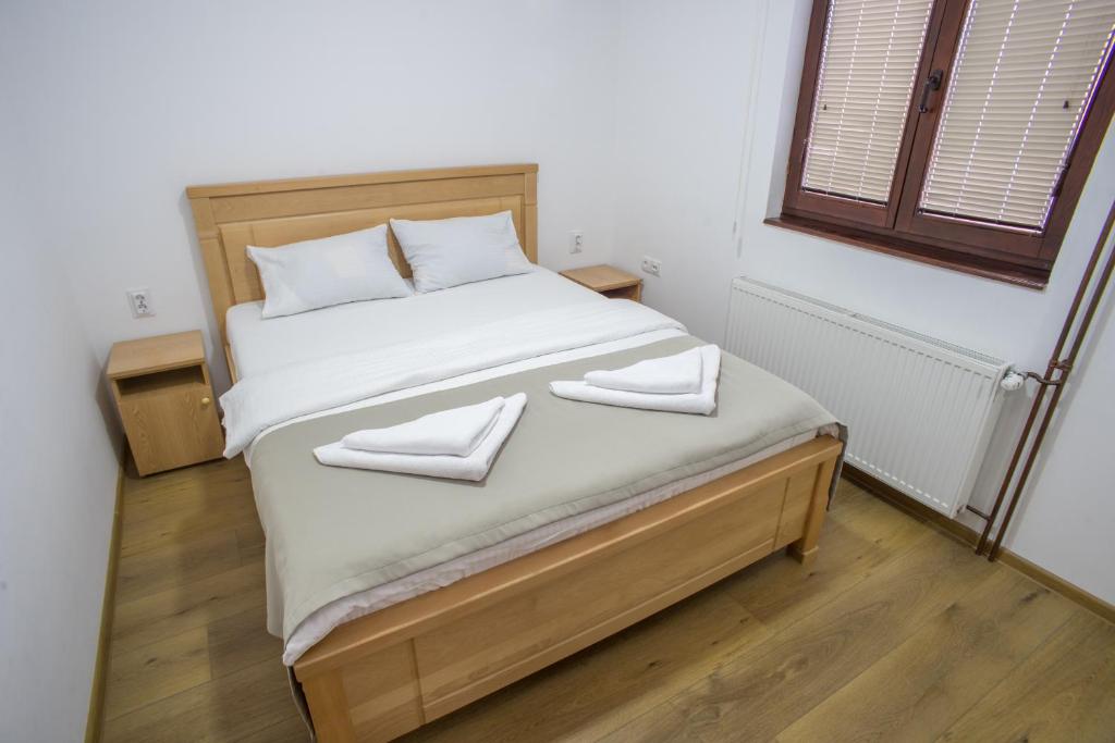Postel nebo postele na pokoji v ubytování Hotel Pavlović