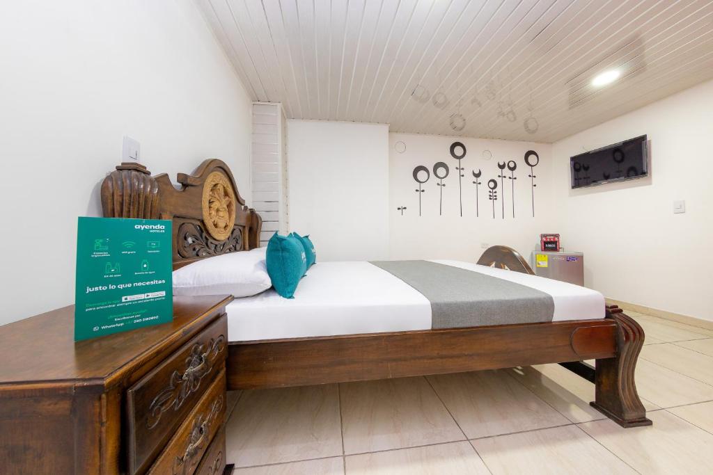 Postel nebo postele na pokoji v ubytování Hotel Vegas Sergio