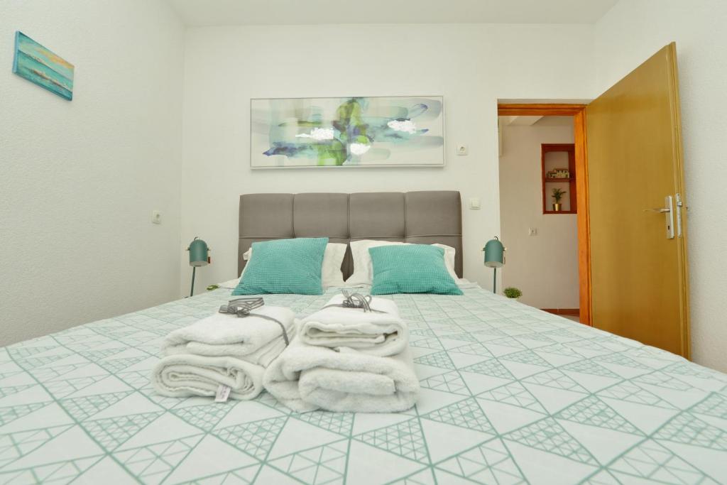 Posteľ alebo postele v izbe v ubytovaní Zadar Apartman Kristijan