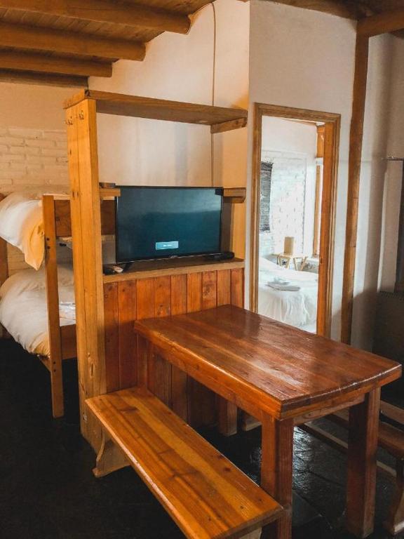 Postel nebo postele na pokoji v ubytování Lodge en Farellones
