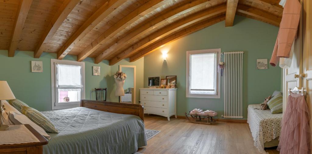 Un pat sau paturi într-o cameră la La Casetta