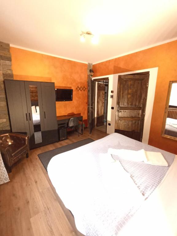 Postel nebo postele na pokoji v ubytování Cà Elsa B&B
