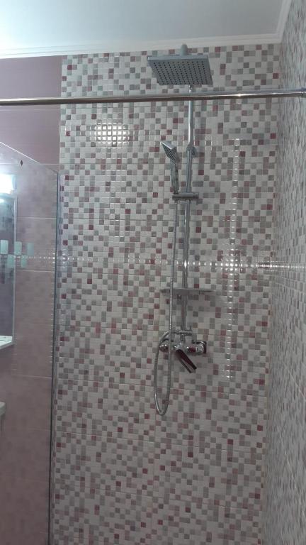 Een badkamer bij Calypso Rooms