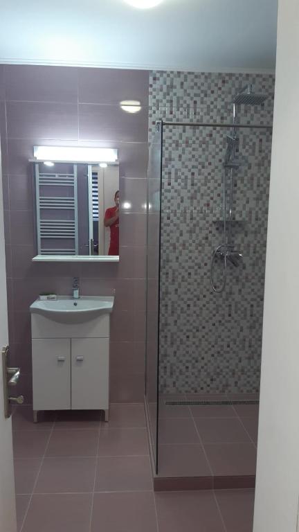 Een badkamer bij Calypso Rooms