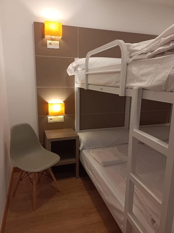 Posteľ alebo postele v izbe v ubytovaní Albergue Hostel Nuestra Señora del Camino