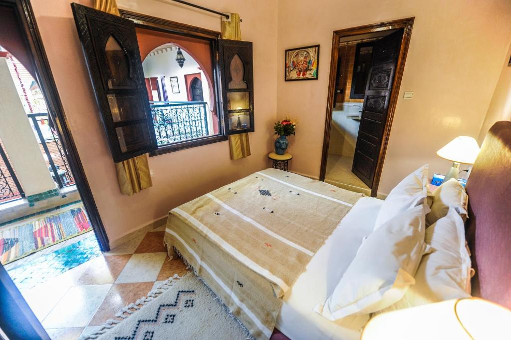 Postel nebo postele na pokoji v ubytování Riad Errabii & Spa