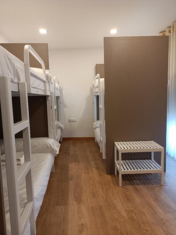 Posteľ alebo postele v izbe v ubytovaní Albergue Hostel Nuestra Señora del Camino