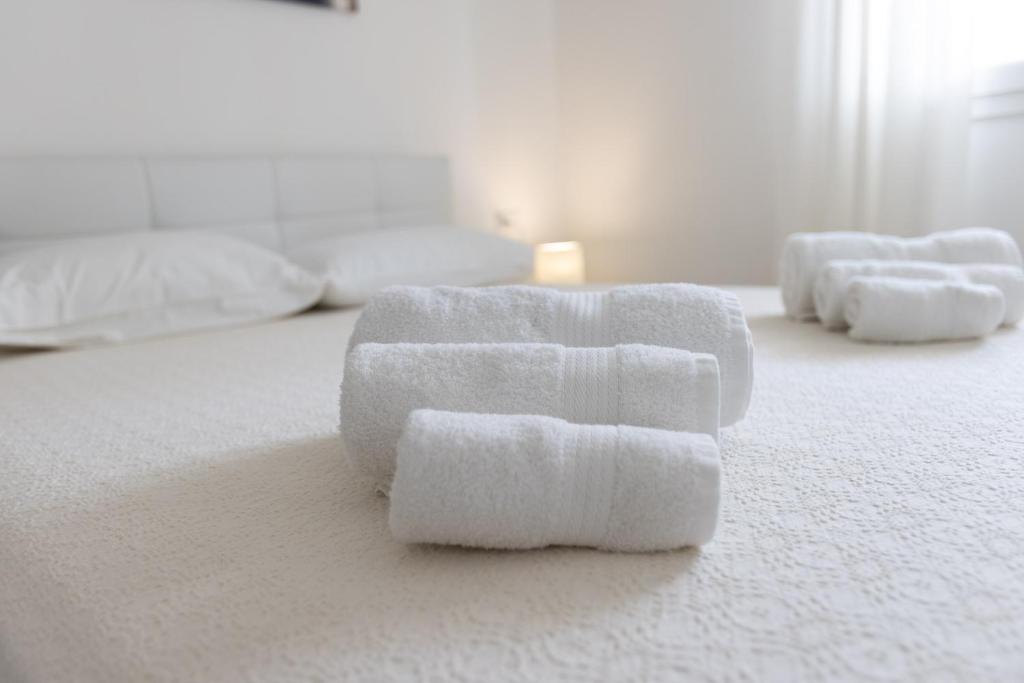 Postel nebo postele na pokoji v ubytování B&B Il più bello dei mari