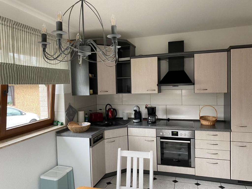 Kuchyň nebo kuchyňský kout v ubytování Ferienwohnung Wiek
