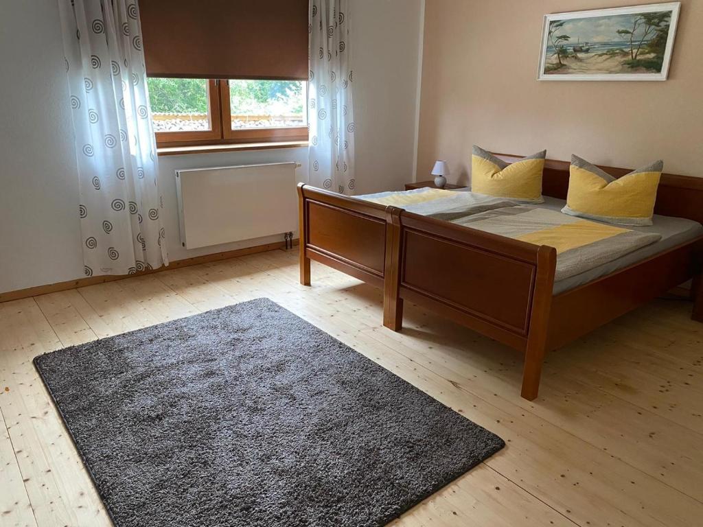 Postel nebo postele na pokoji v ubytování Ferienwohnung Wiek
