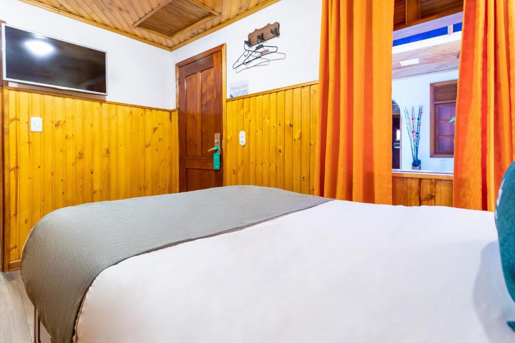 Postel nebo postele na pokoji v ubytování Casa Candilejas
