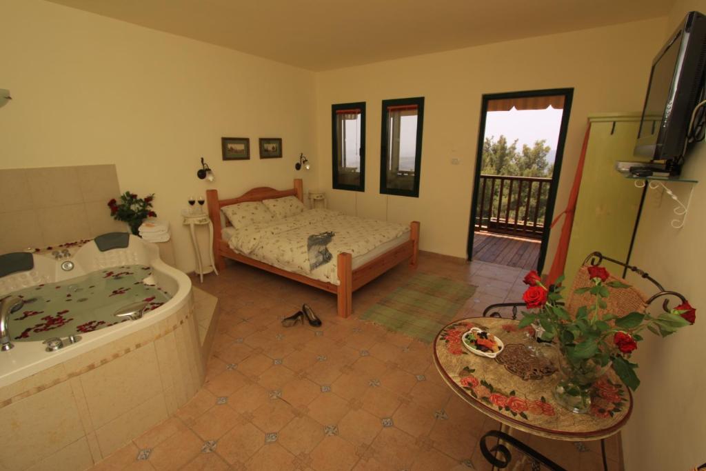 Postel nebo postele na pokoji v ubytování Honny - Boutique Hotel