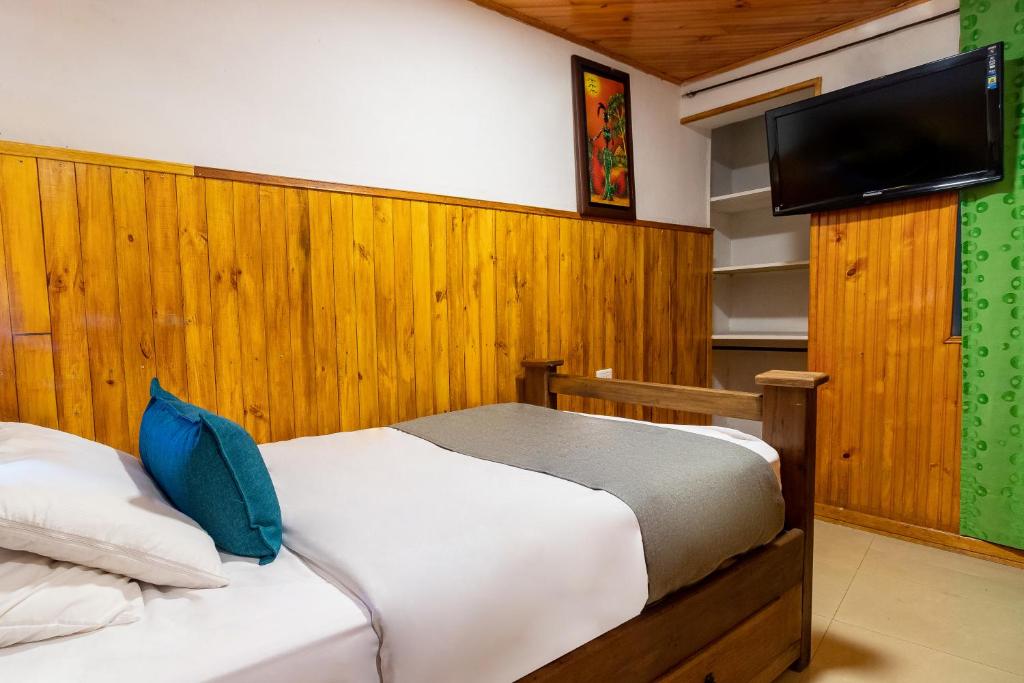 Postel nebo postele na pokoji v ubytování Casa Candilejas