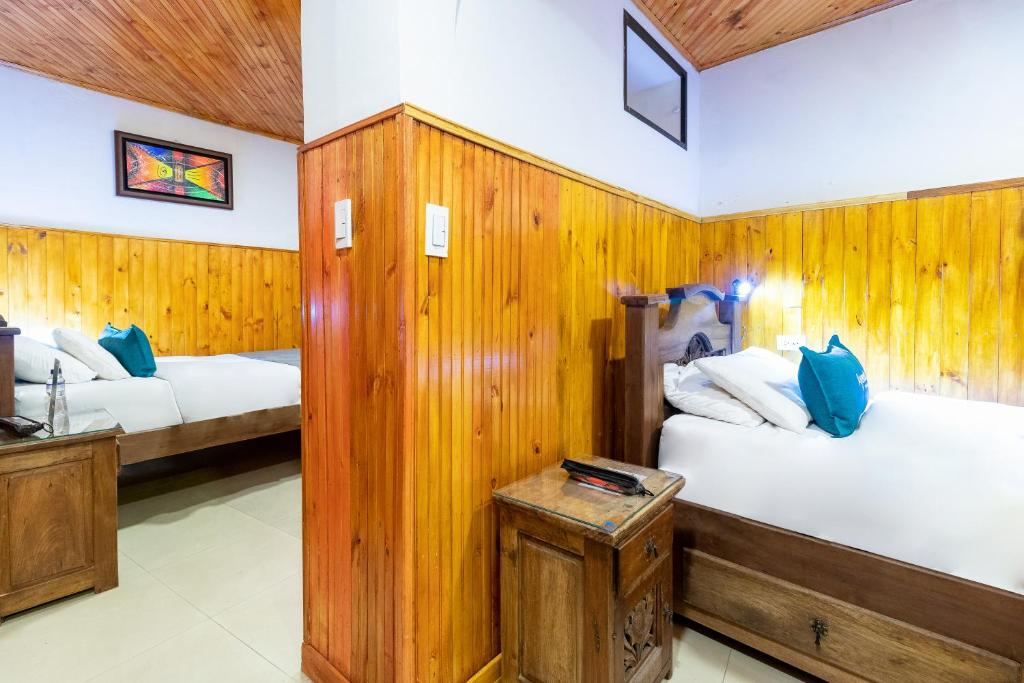 Postel nebo postele na pokoji v ubytování Casa Candilejas