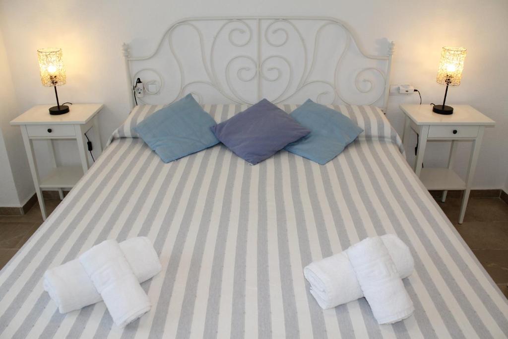 Posteľ alebo postele v izbe v ubytovaní Apartamento El Faro Leisure Port