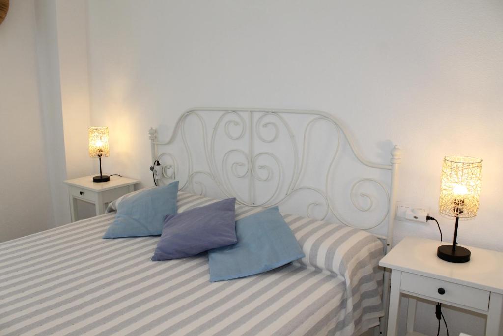 Posteľ alebo postele v izbe v ubytovaní Apartamento El Faro Leisure Port