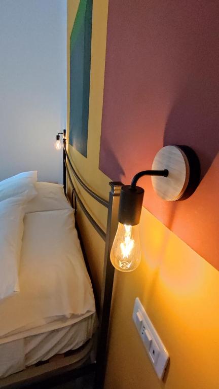 Postel nebo postele na pokoji v ubytování A Due Passi - Superior B&B