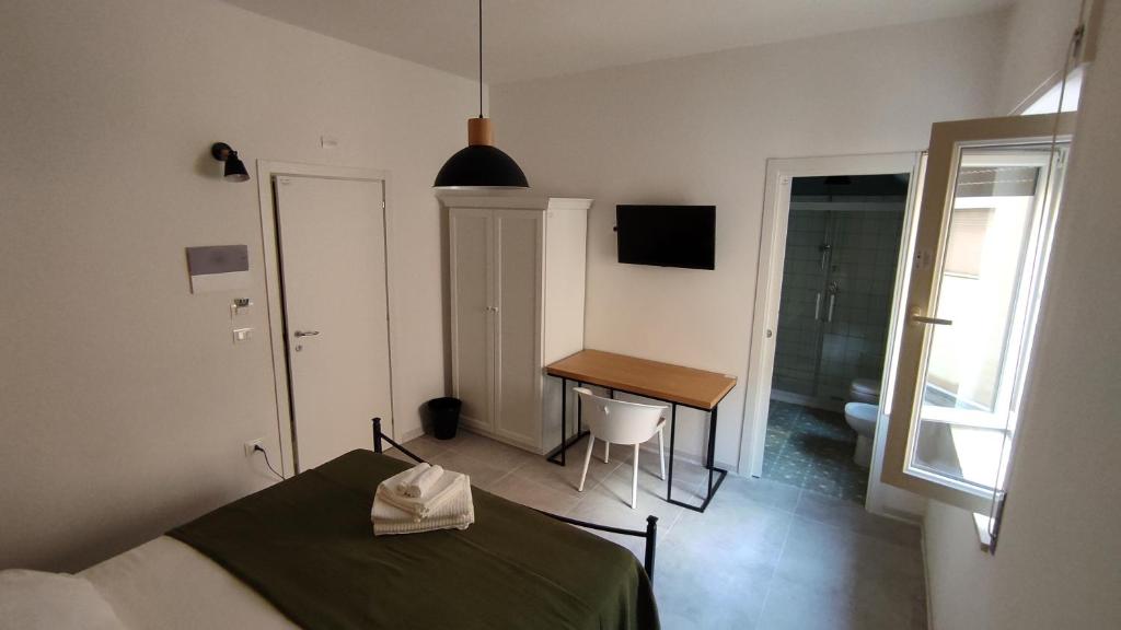 TV a/nebo společenská místnost v ubytování A Due Passi - Superior B&B