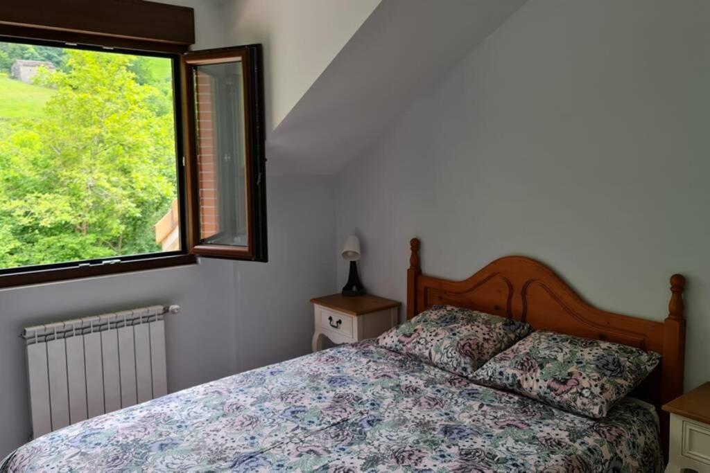 Postel nebo postele na pokoji v ubytování La Pasiega