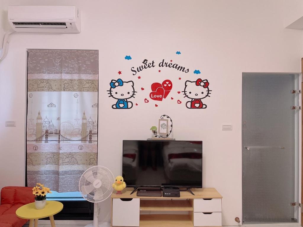 Een TV en/of entertainmentcenter bij 星動小屋民宿
