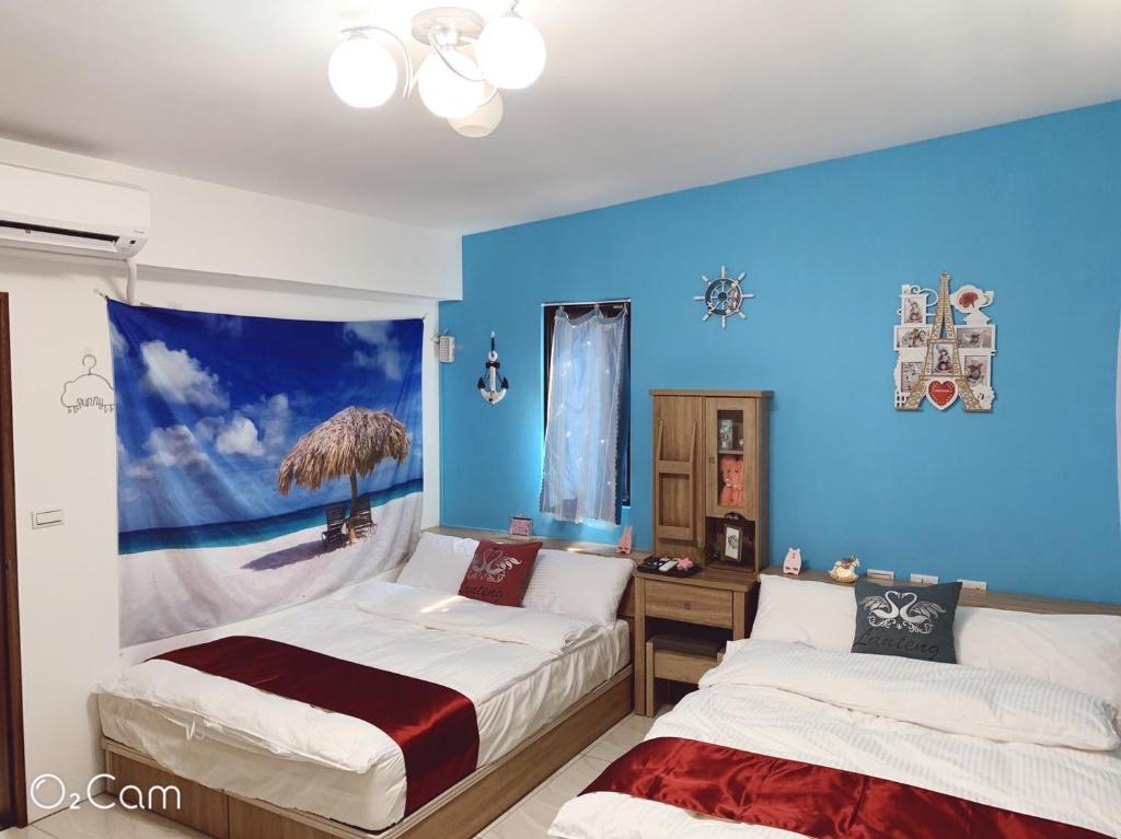 Een bed of bedden in een kamer bij 星動小屋民宿