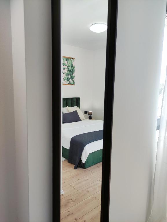 Postel nebo postele na pokoji v ubytování Lazy 8 Villa