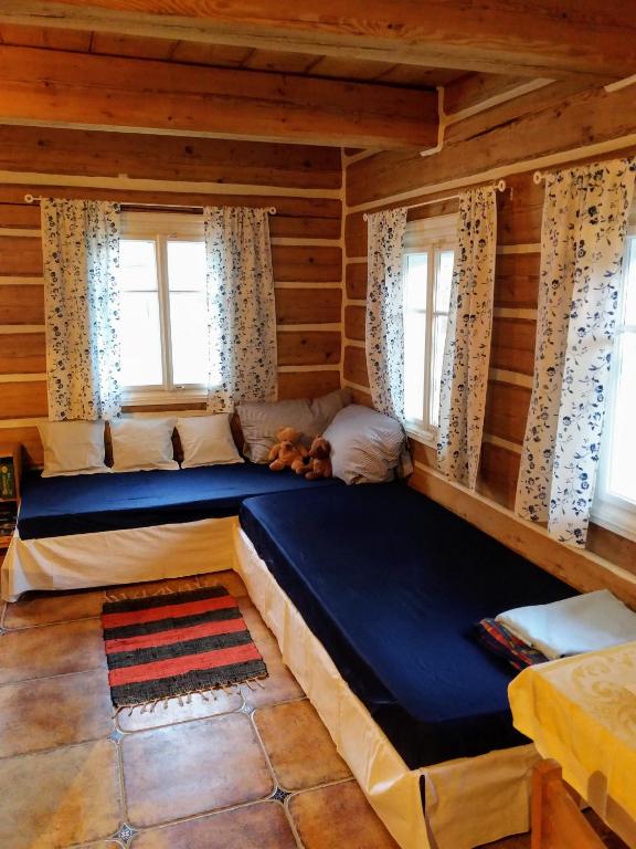 Postel nebo postele na pokoji v ubytování Medová chalupa