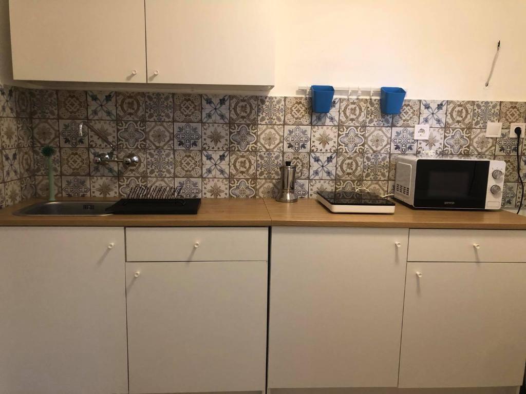 Köök või kööginurk majutusasutuses Imola Apartman Fonyód