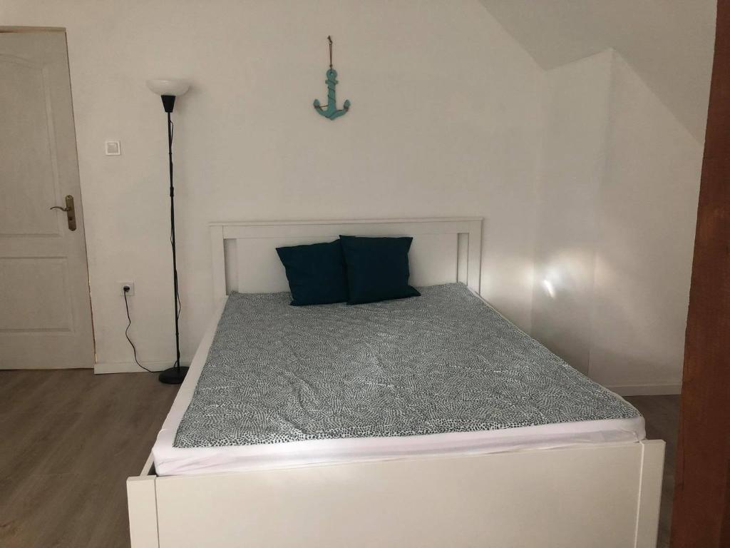 Voodi või voodid majutusasutuse Korall Apartman Fonyód toas