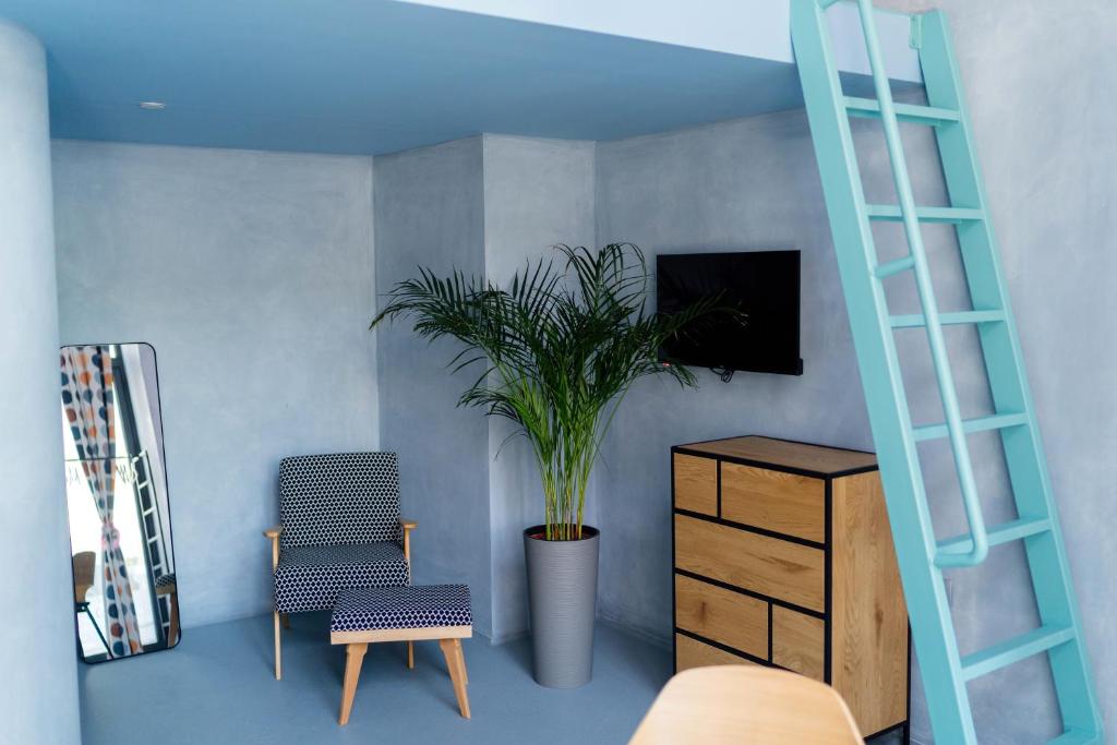 TV a/nebo společenská místnost v ubytování Tomosmatik Apartments Koper by Locap Group