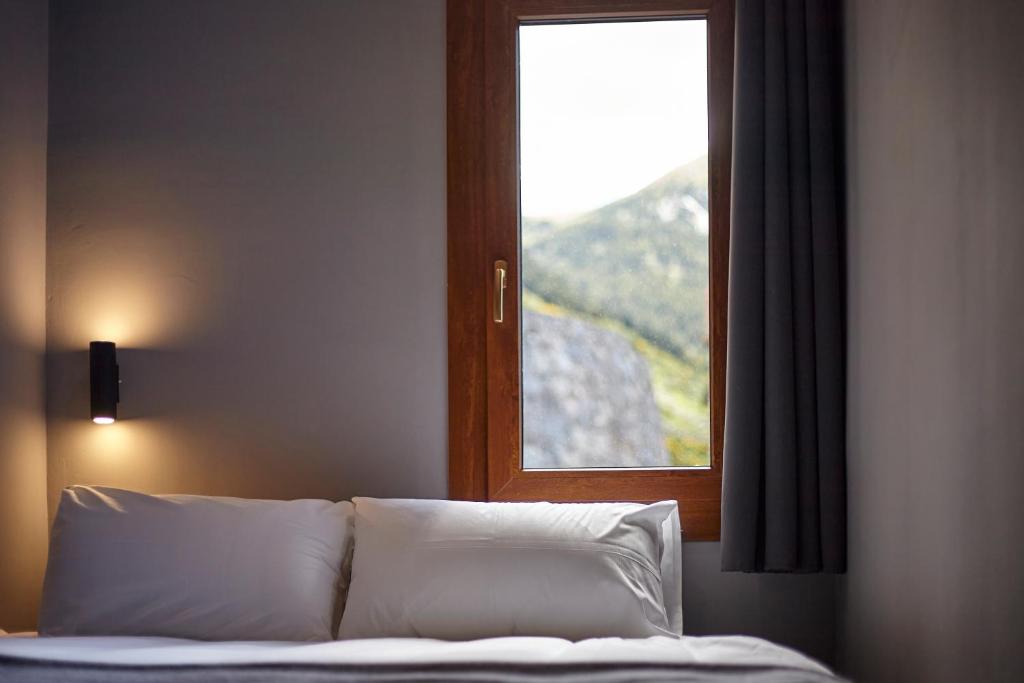 Postel nebo postele na pokoji v ubytování Soldeu Gall de Bosc Luxury Apartment apt Bon aire