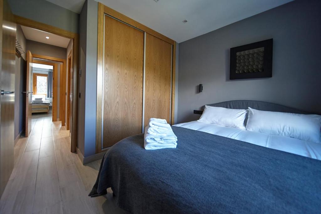 Postel nebo postele na pokoji v ubytování Soldeu Gall de Bosc Luxury Apartment apt Bon aire