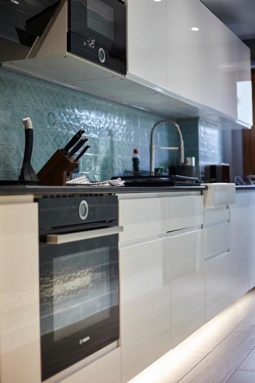 Kuchyň nebo kuchyňský kout v ubytování Soldeu Gall de Bosc Luxury Apartment apt Bon aire