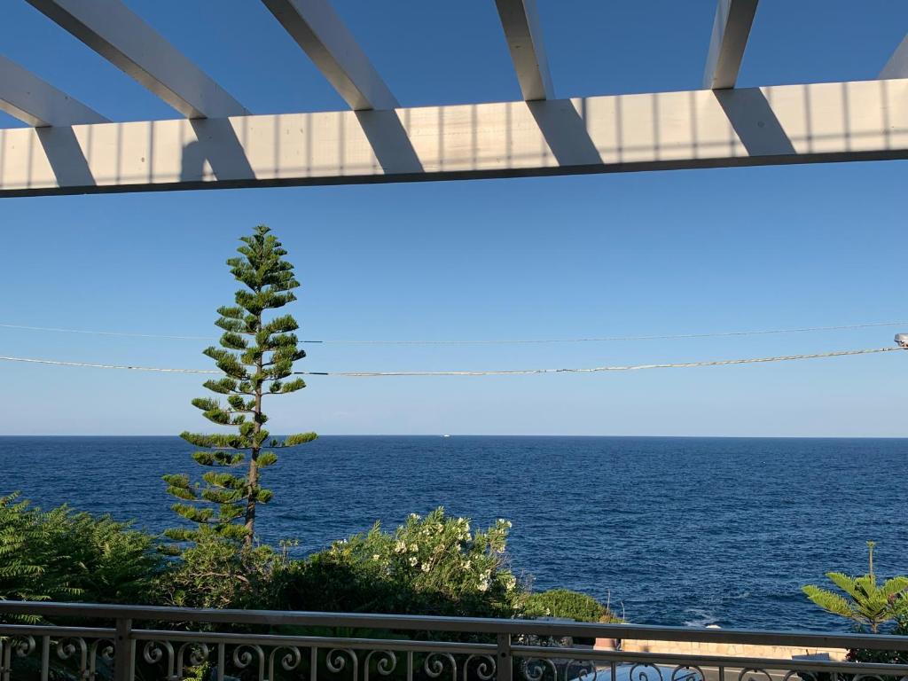 a view of the ocean from the balcony at Casa vacanze vista mare Salento Tricase Porto villa Antonio e villa Rosanna in Marina Porto