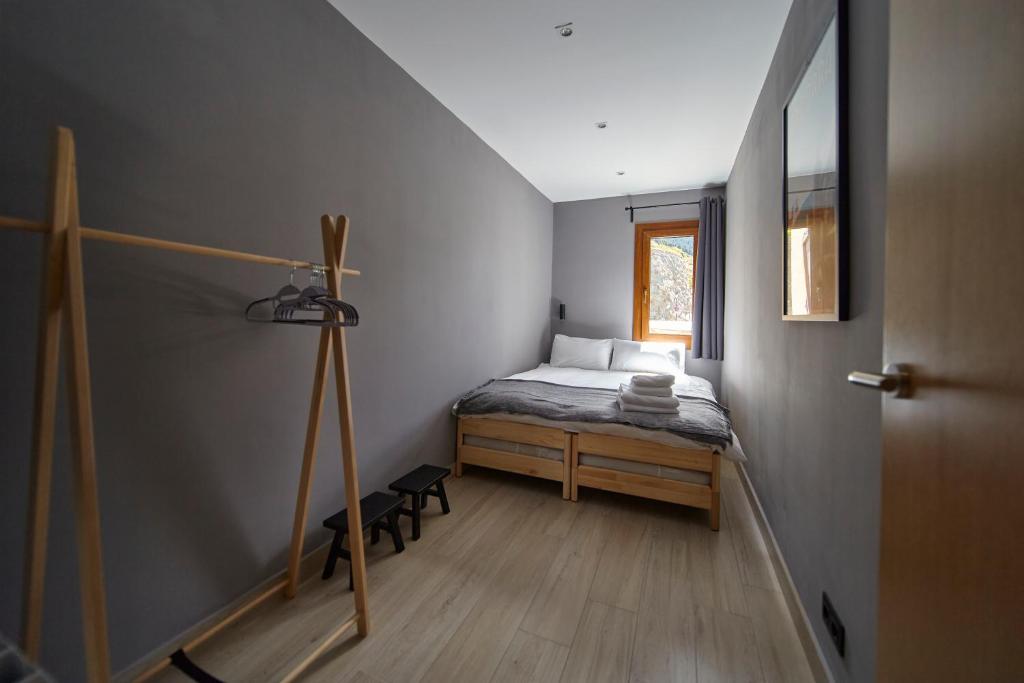 Postel nebo postele na pokoji v ubytování Soldeu Gall de Bosc Luxury Apartment apt Bon aire