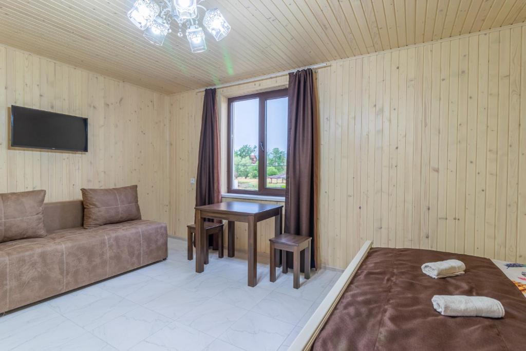 Postel nebo postele na pokoji v ubytování Nikoletta