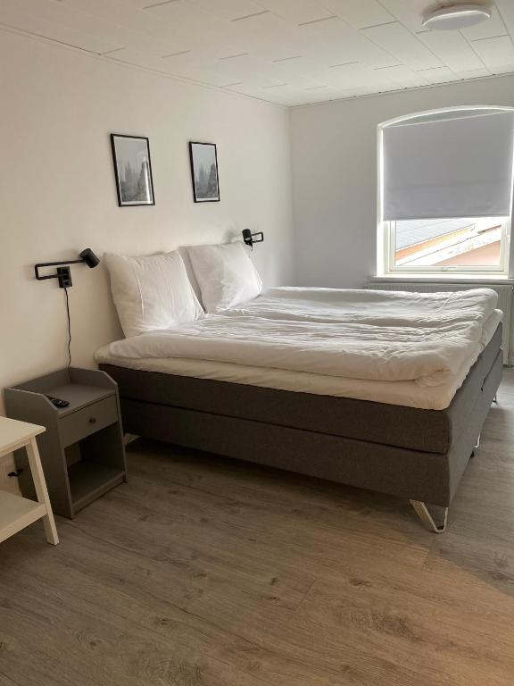 Postel nebo postele na pokoji v ubytování Hotel Røde-Kro