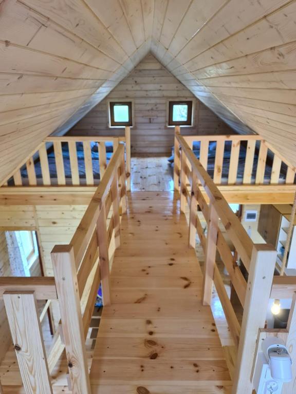 Fotografia z galérie ubytovania Siedlisko nad jeziorem Skarlińskim 5B, mazury, jezioro, domek, bania v destinácii Kurzętnik